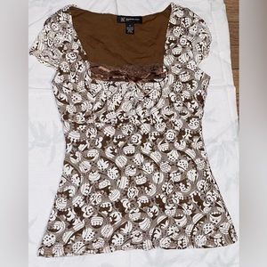 Cute little top from INC the size is S